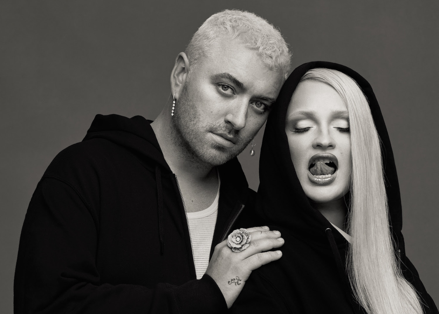 Sam Smith with a hand on Kim Petras' shoulder for their "Unholy" single in monochrome