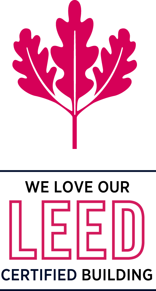 Magenta three-lobed stylized oak leaf above bold outlined 'LEED' letters with smaller navy 'CERTIFIED' text beneath, separated by lines.