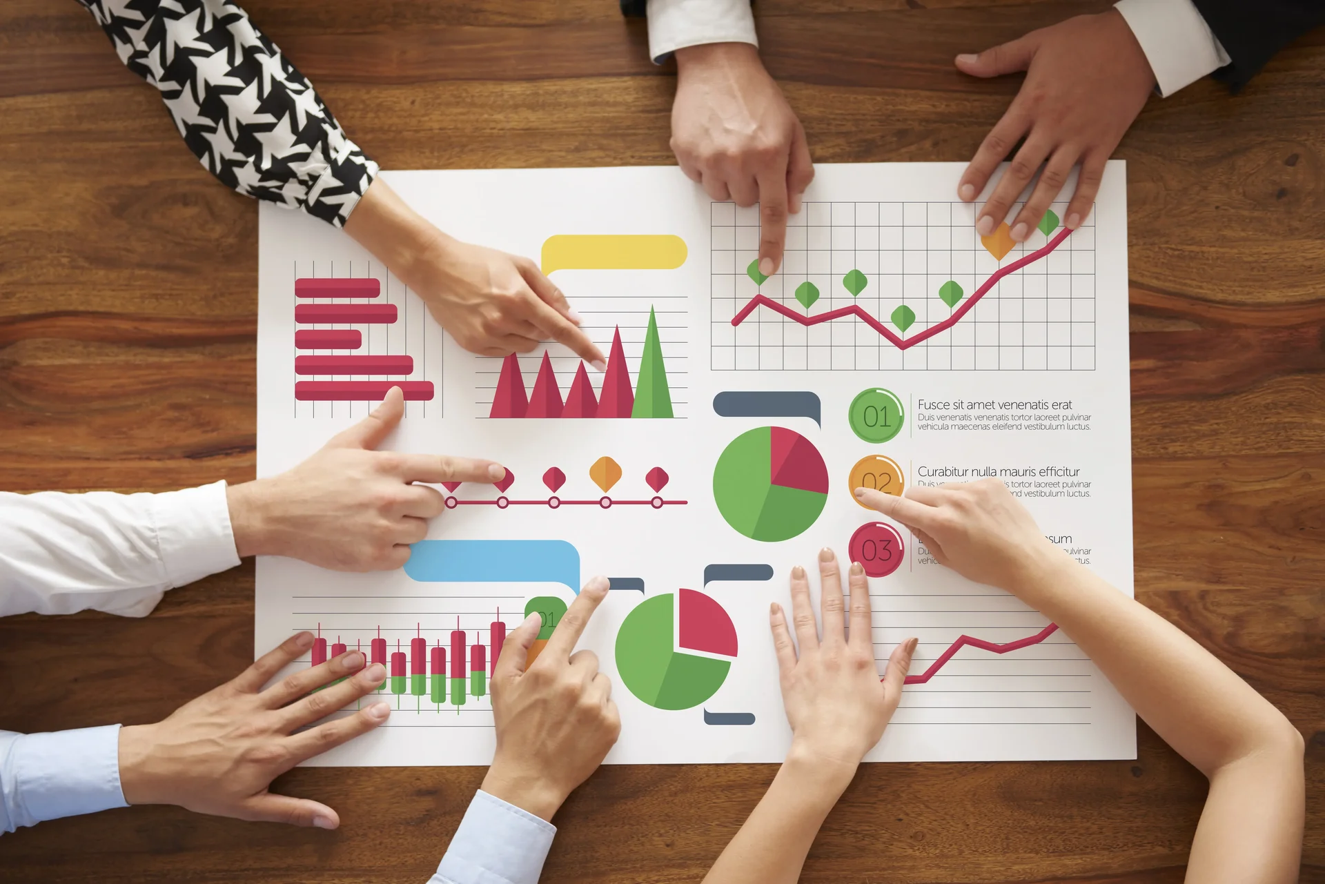 Business people analyzing many charts 2024 11 25 19 47 27 utc