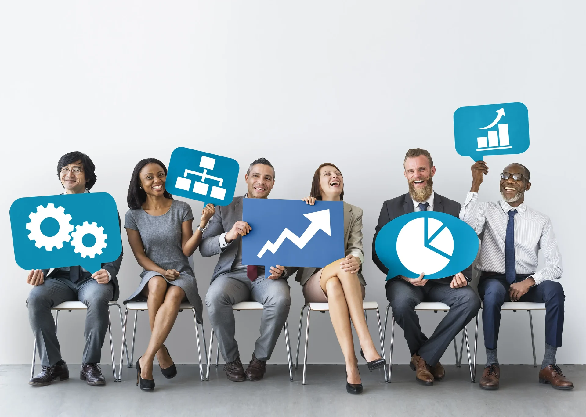 Diverse business people holding icons 2025 02 09 22 57 59 utc