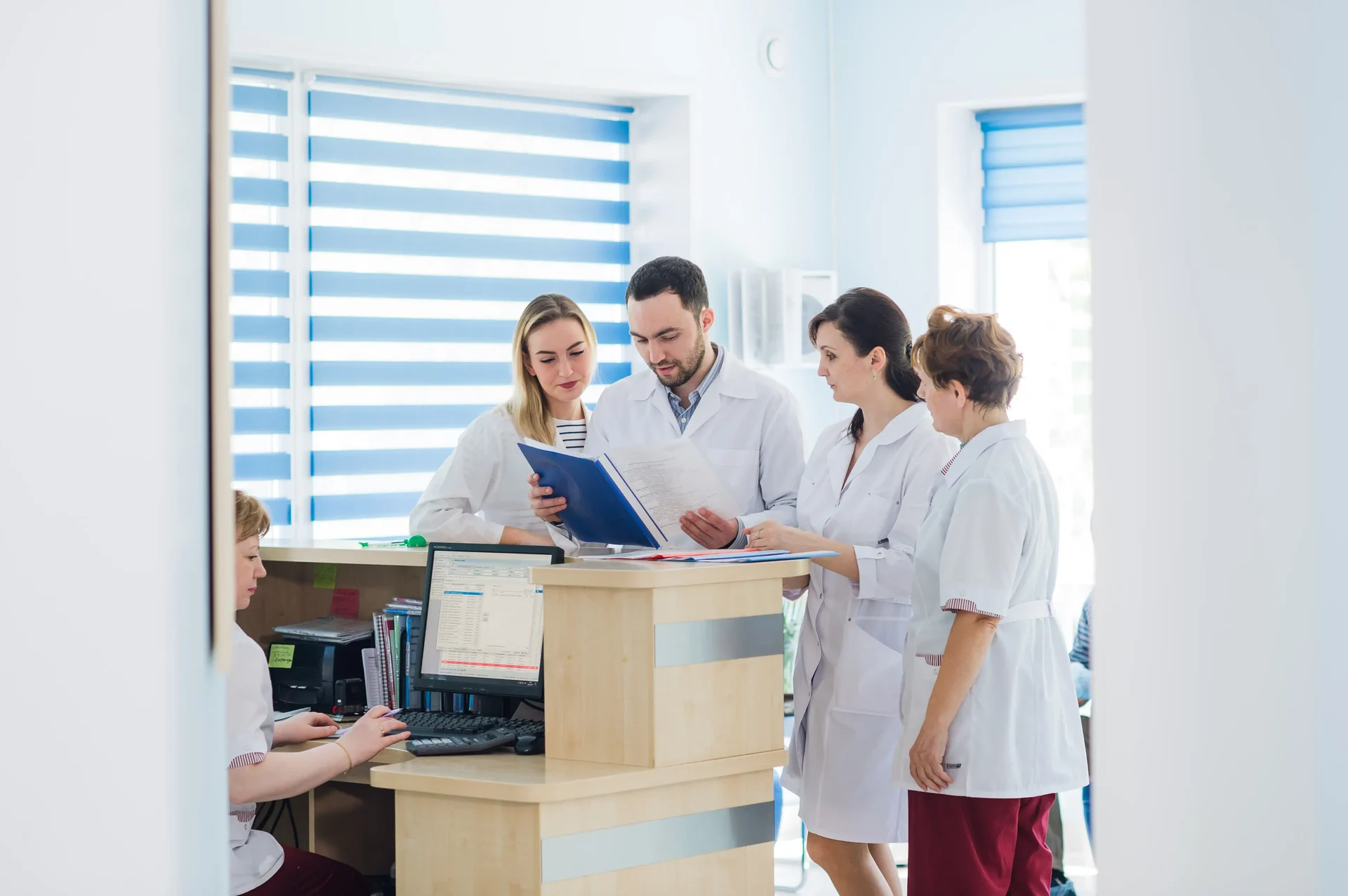 Doctor and receptionist at reception in a hospital 2024 11 03 00 42 37 utc