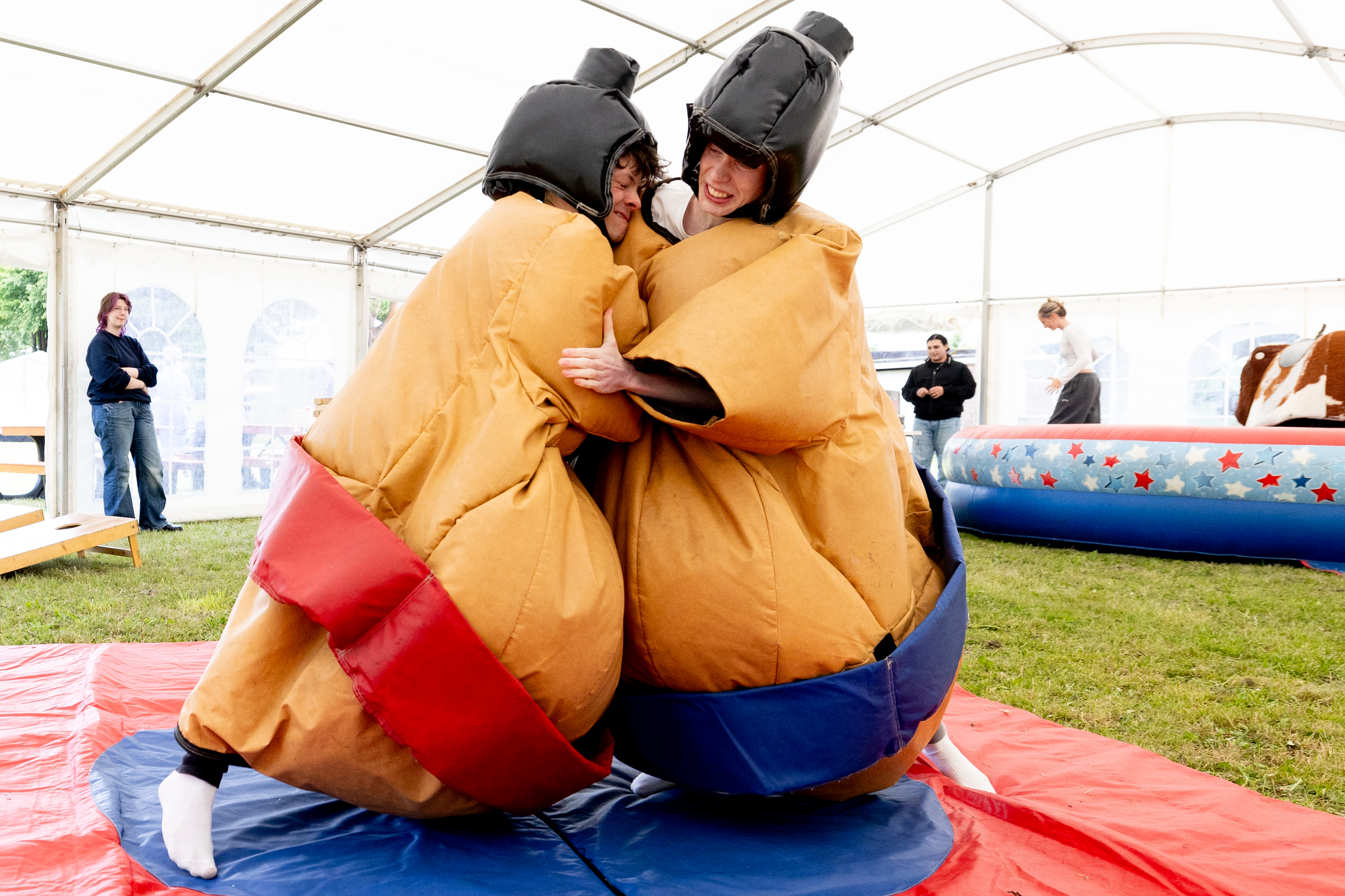6th-Form - Highlands Fete 2024 - Two Students Sumo Wrestling at a Celebration Event