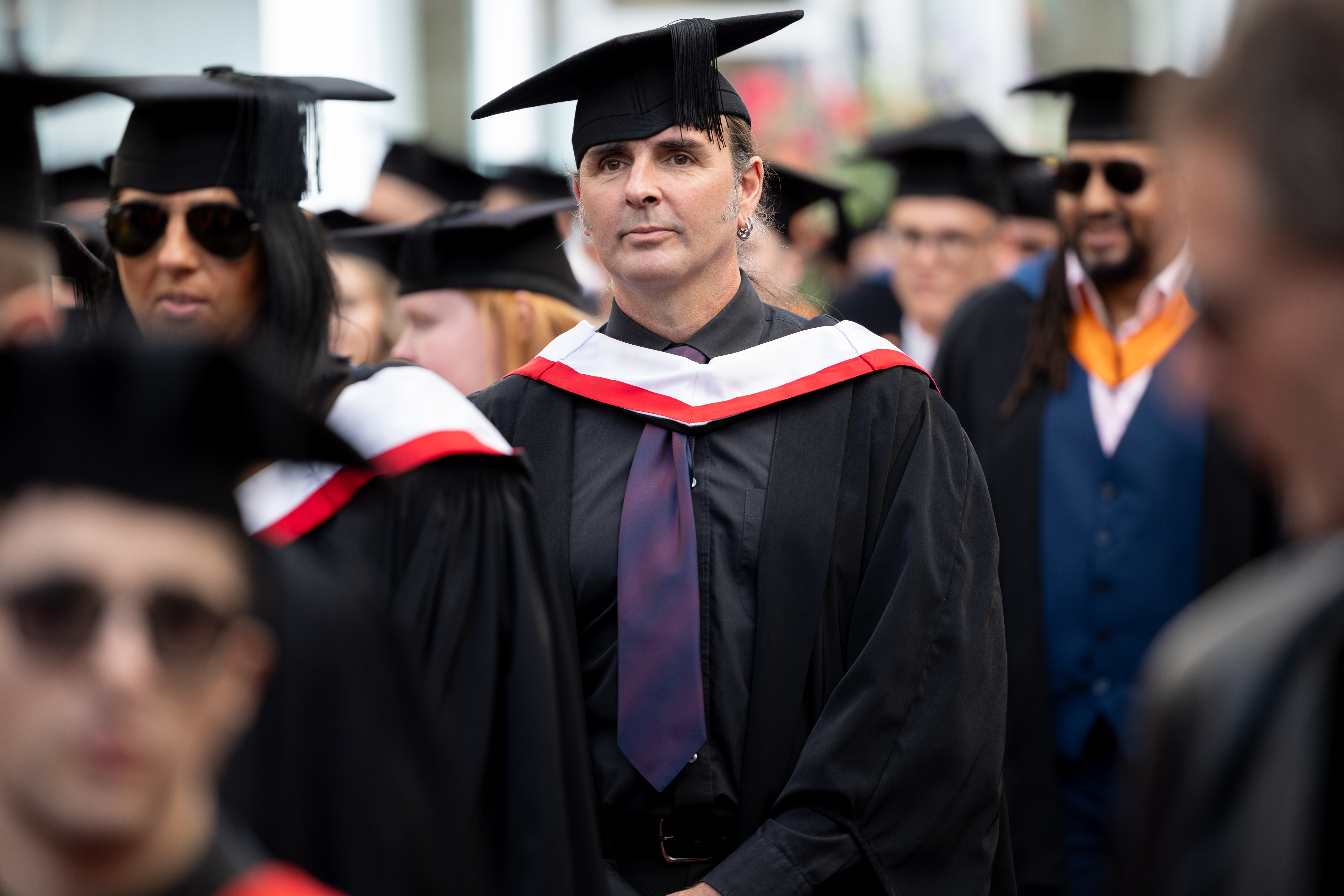 Highlands Professional - Graduate Student in the Graduation Parade
