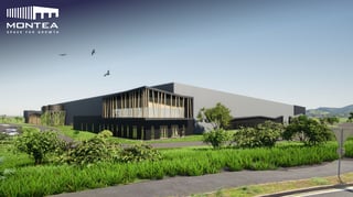 Vue d'artiste d'un futur entrepôt logistique Montea à façade en lattes de bois et aménagement paysager à Combronde, France