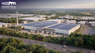 Vogelvluchtrendering van de geplande LUMINEUS logistieke hub in Lummen met magazijngebouwen, laadkades, groenaanleg en een windturbine.