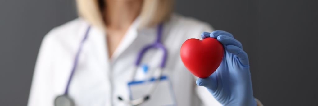 Doctor with red heart