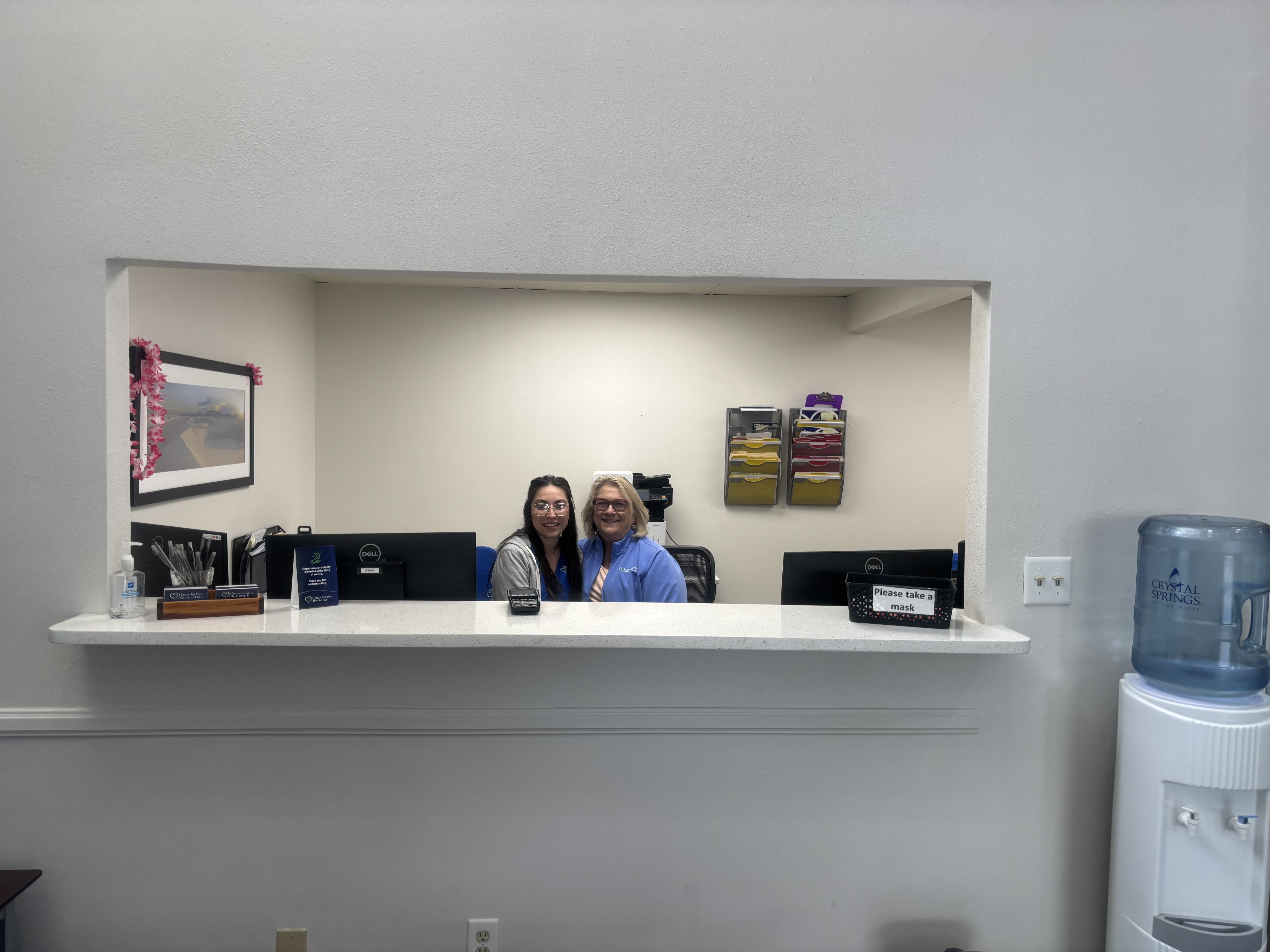 Interior photo of the Albuquerque, New Mexico location of center for Vein Restoration showing the reception desk