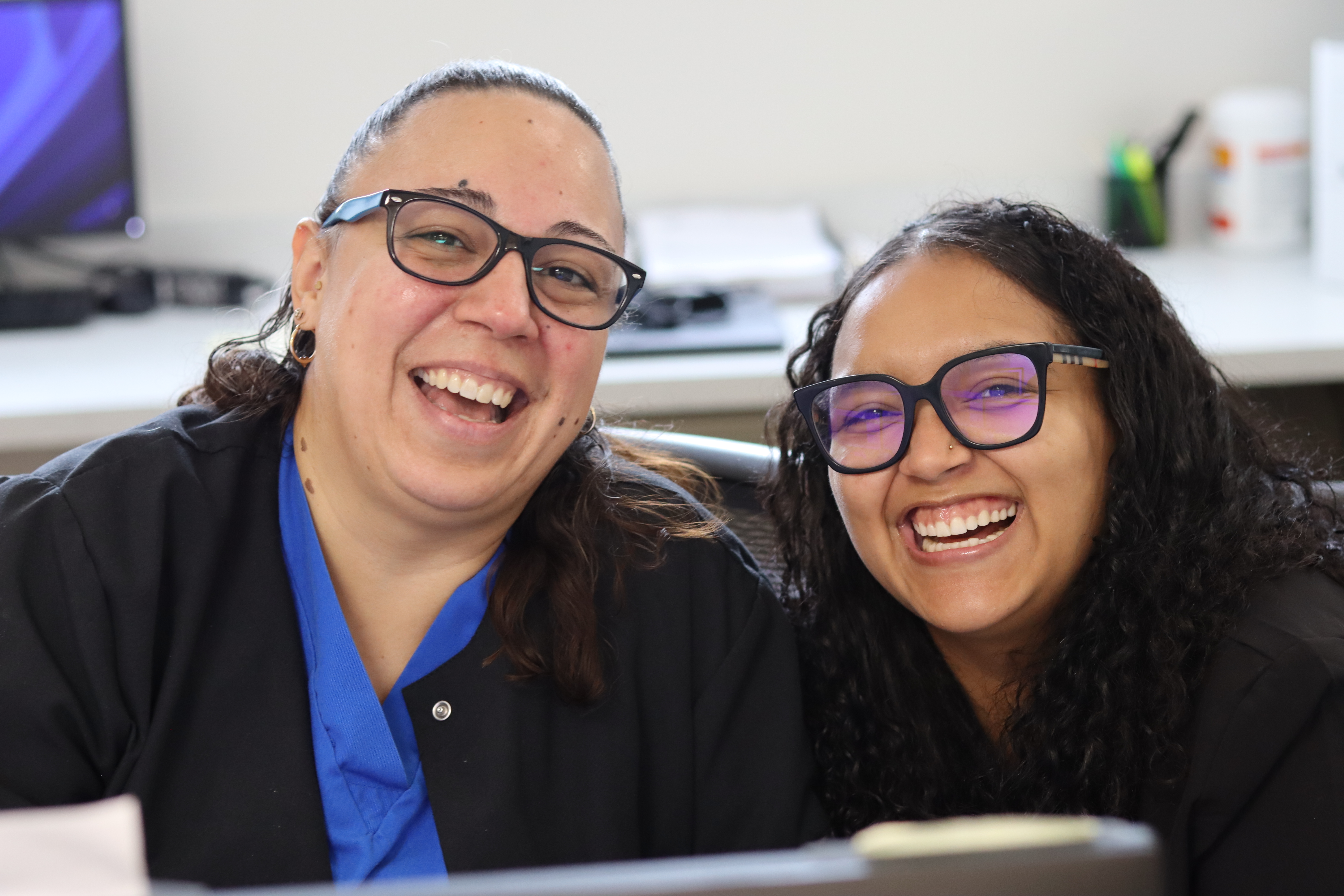 Interior photo of the Center for Vein Restoration in Waterbury, Connecticut showing the front desk staff