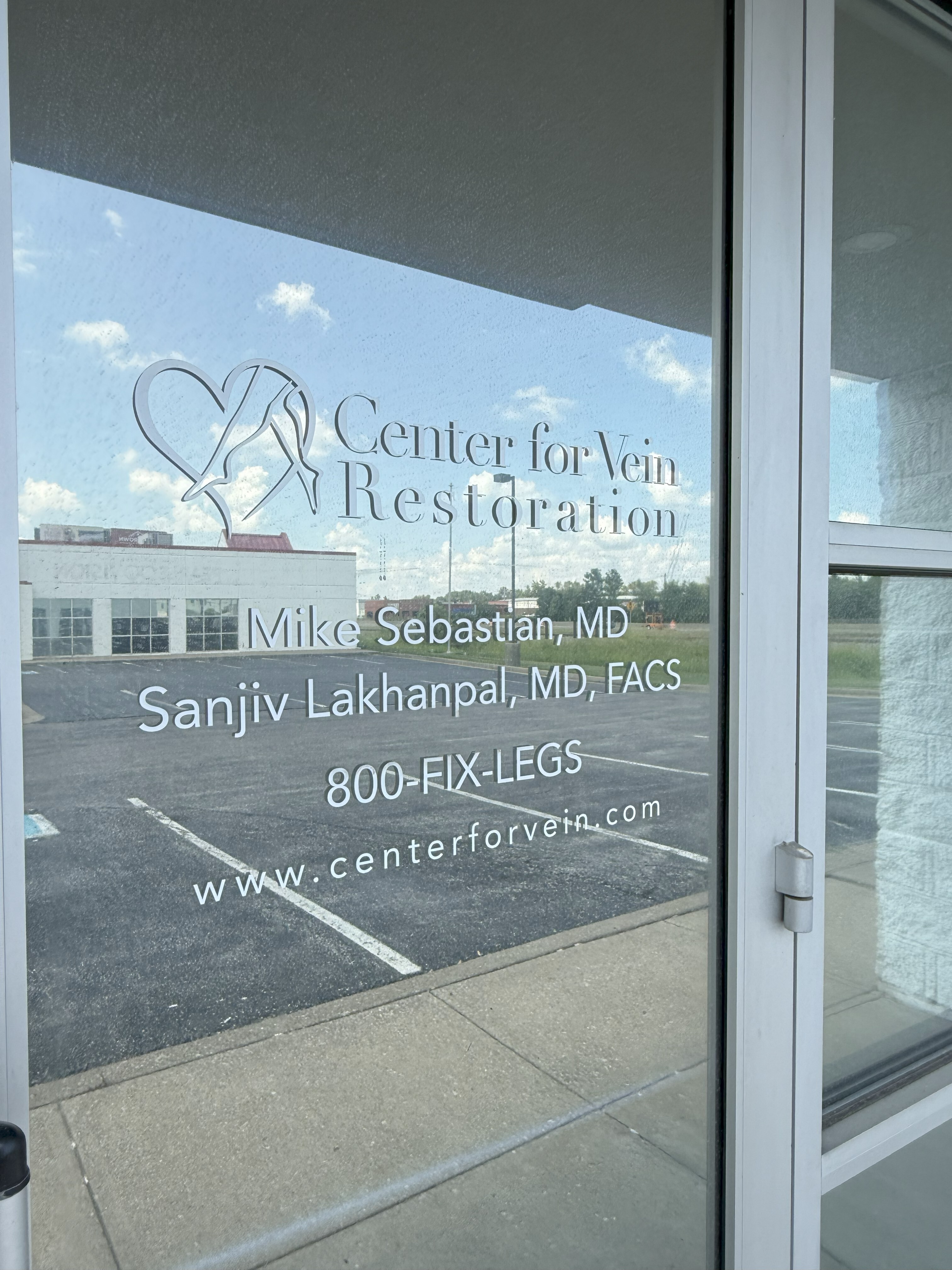 Exterior photo at the Evansville, IN location for Center for Vein Restoration showing the front door