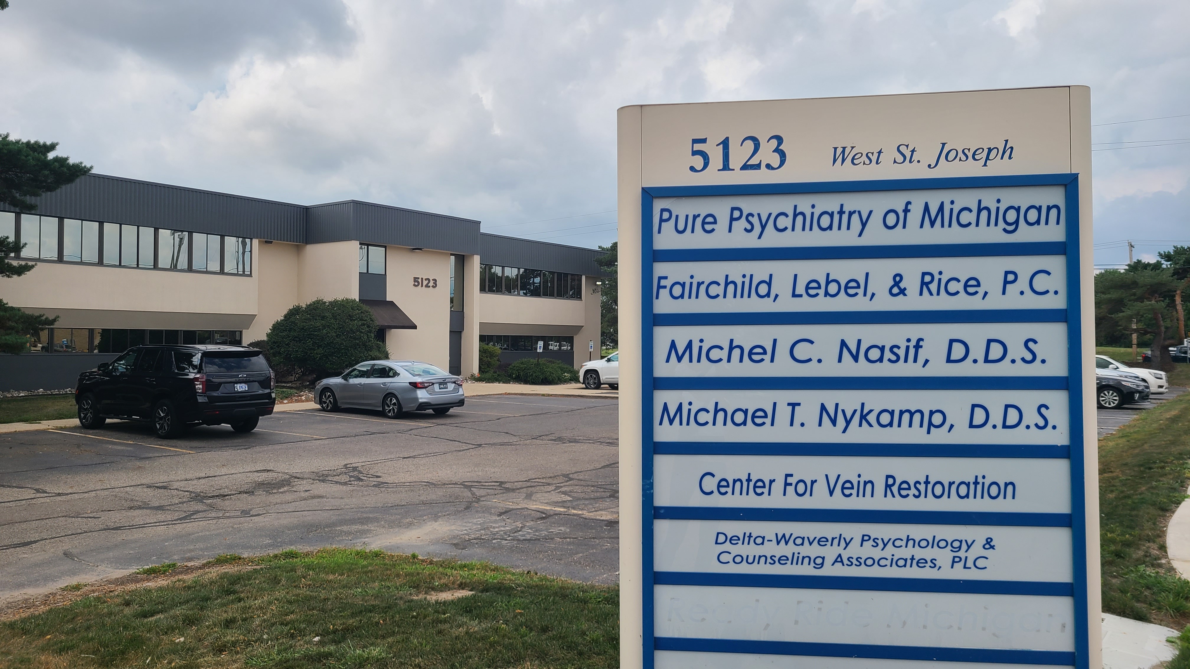 Exterior photo of the Lansing, Michigan location of center for Vein Restoration showing the outside of the building