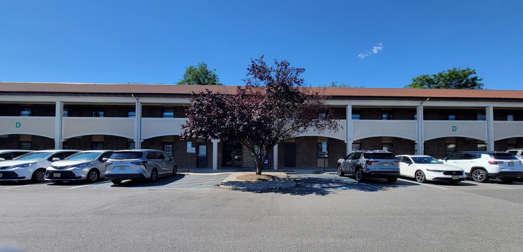 Exterior photo of the Union, NJ location of Center for Vein Restoration showing the outside of the building and parking lot