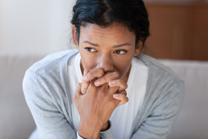 Woman with hands crossed