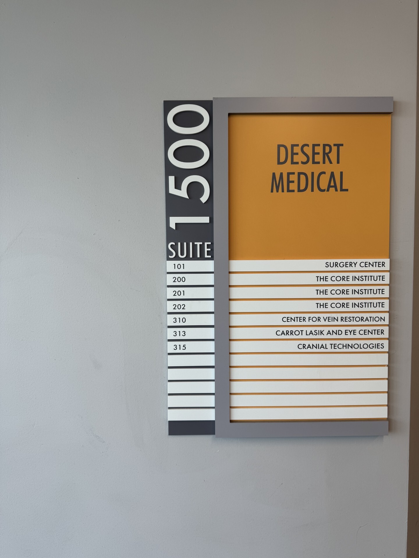 Exterior photo of the Mesa, AZ Center for Vein Restoration showing the building directory