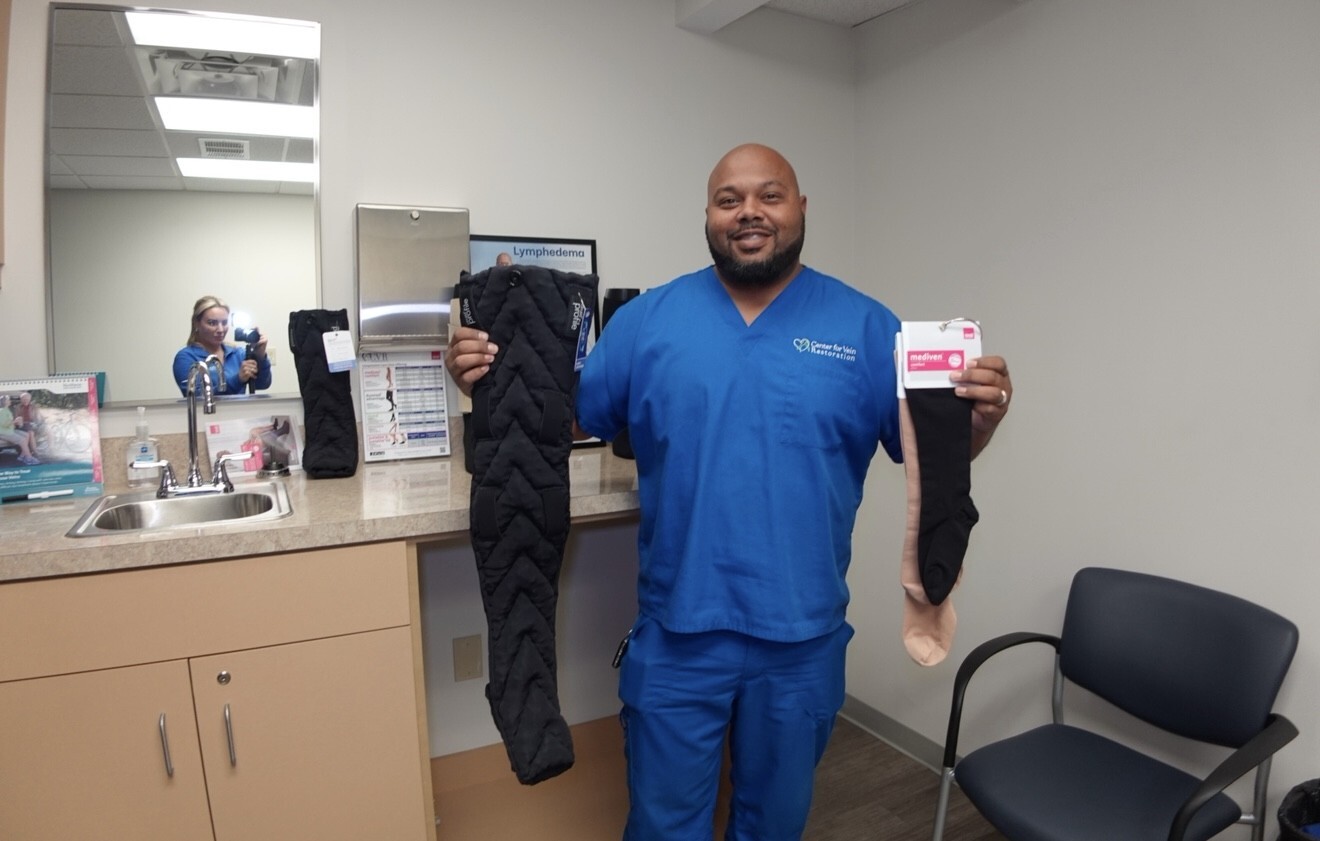 photo of employee at the Gahanna, OH location of Center for Vein Restoration showing leg compressions