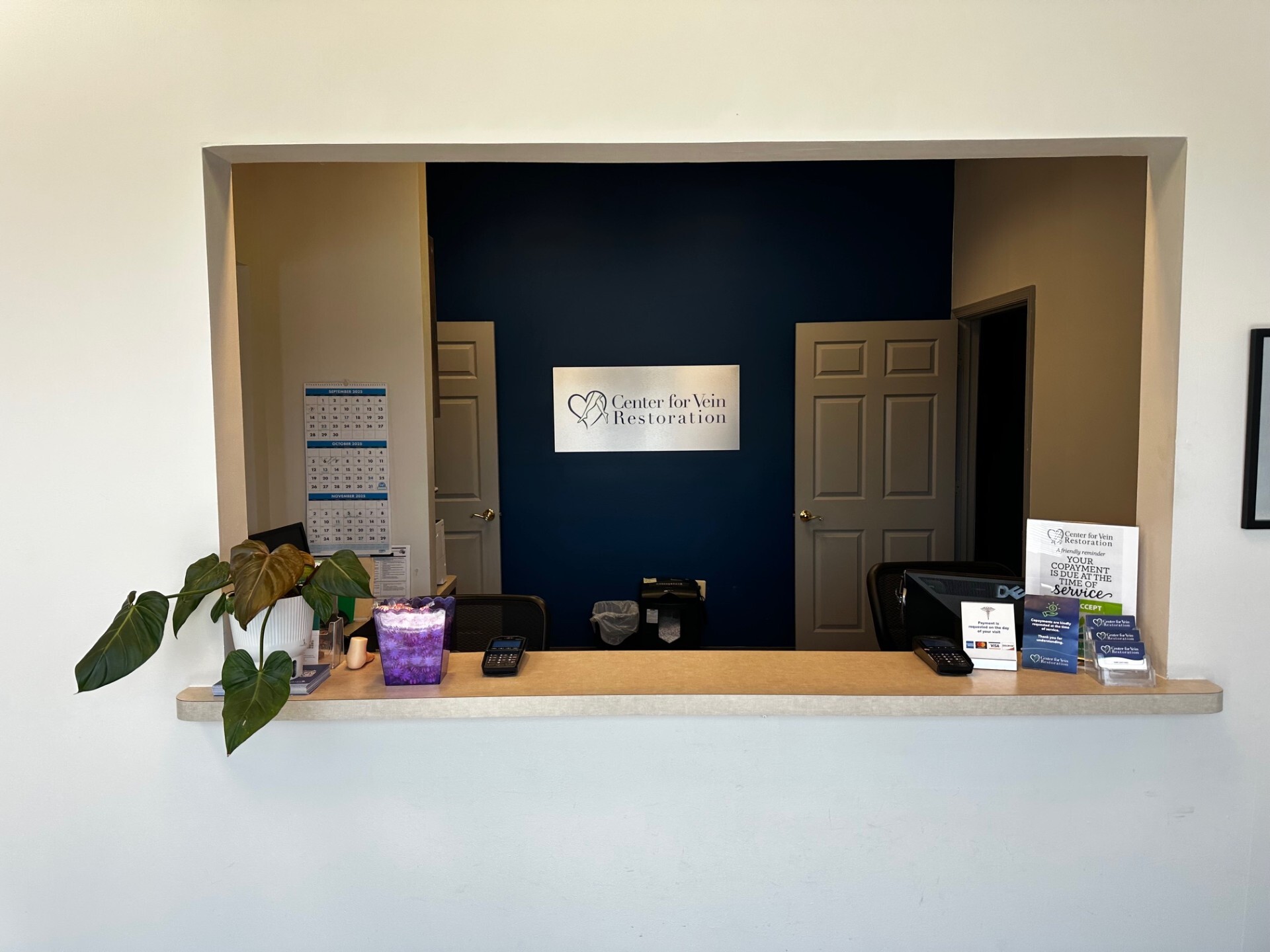 Interior photo of the Waldorf, MD location of Center for Vein Restoration showing the front desk