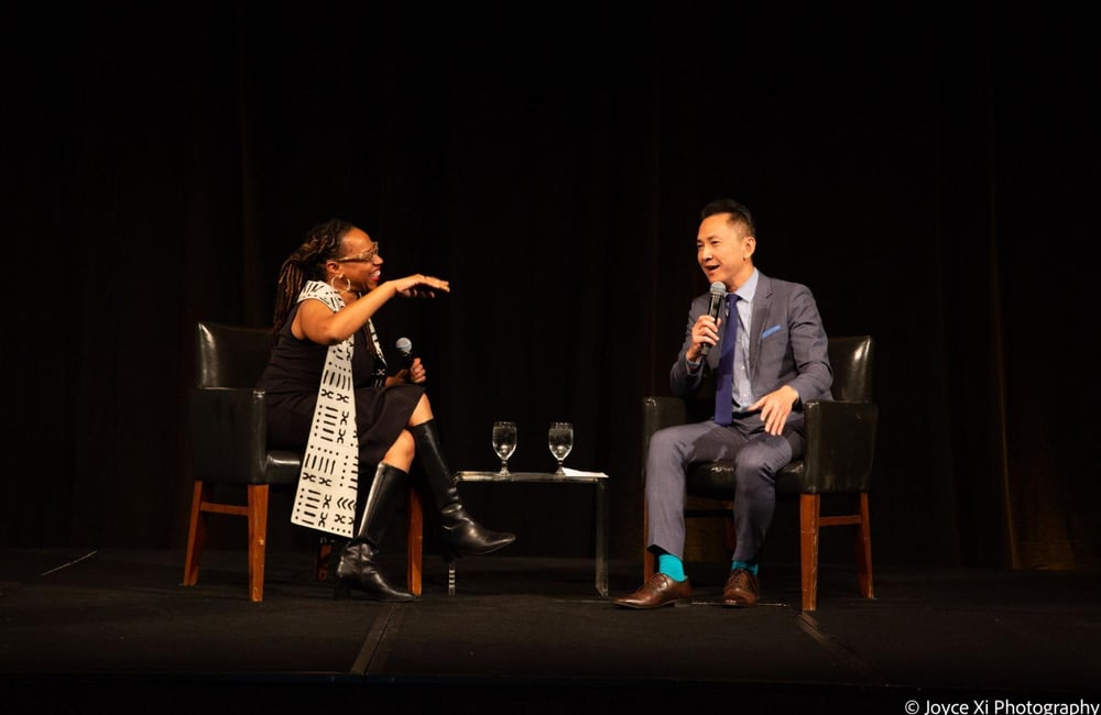Lateefah Simon and author Viet Thanh Nguyen sit on stage for a conversation on racial justice at ALC's 50th Gala.