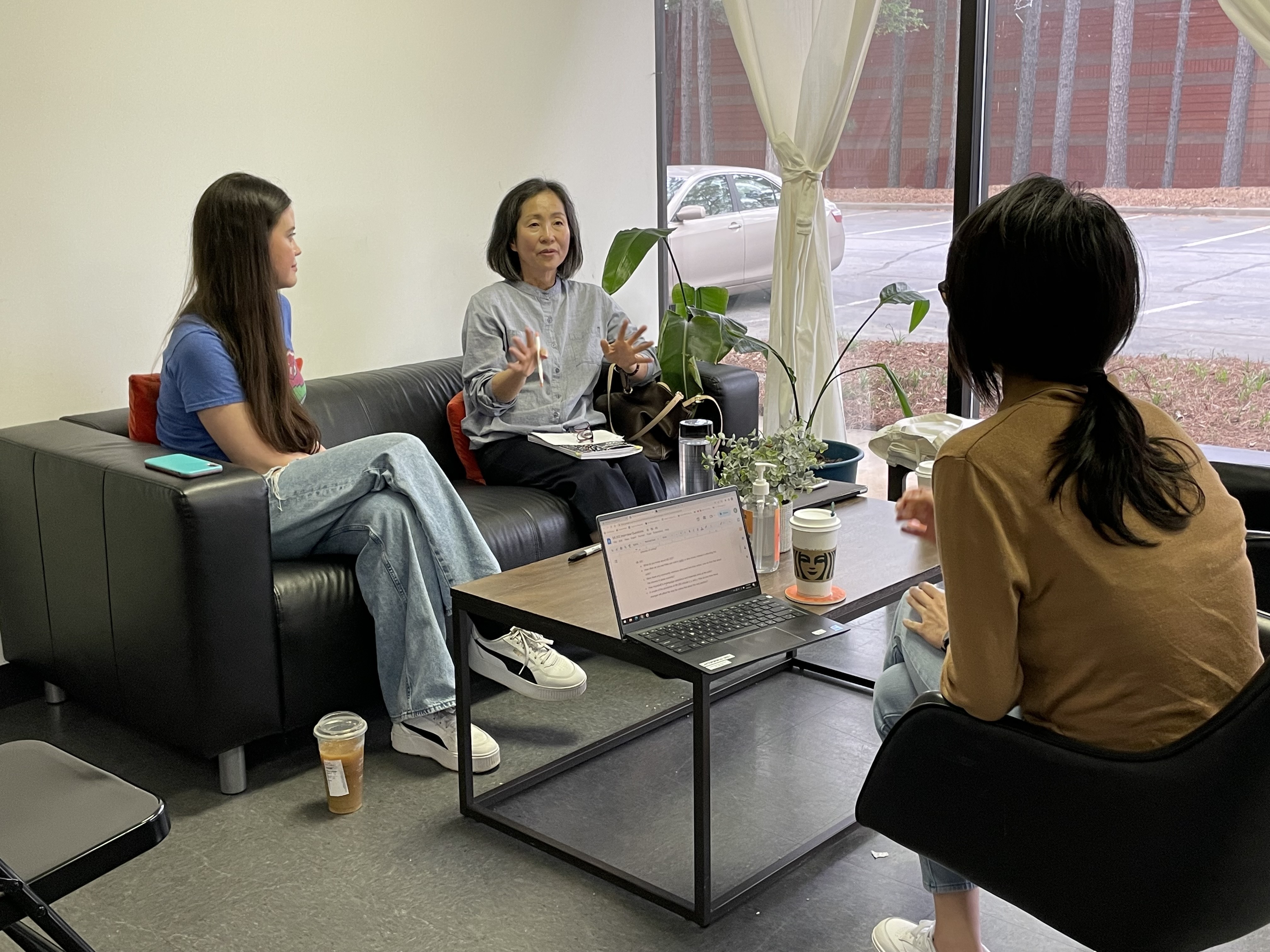 Kay Kang engaged in conversation with Litigation Director Meredyth Yoon and Voting Rights Legal Fellow Kim Leung.