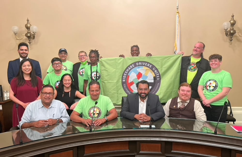 Rideshare Drivers United members, Asian Law Caucus staff, and other community partners host a briefing for legislators in Sacramento.