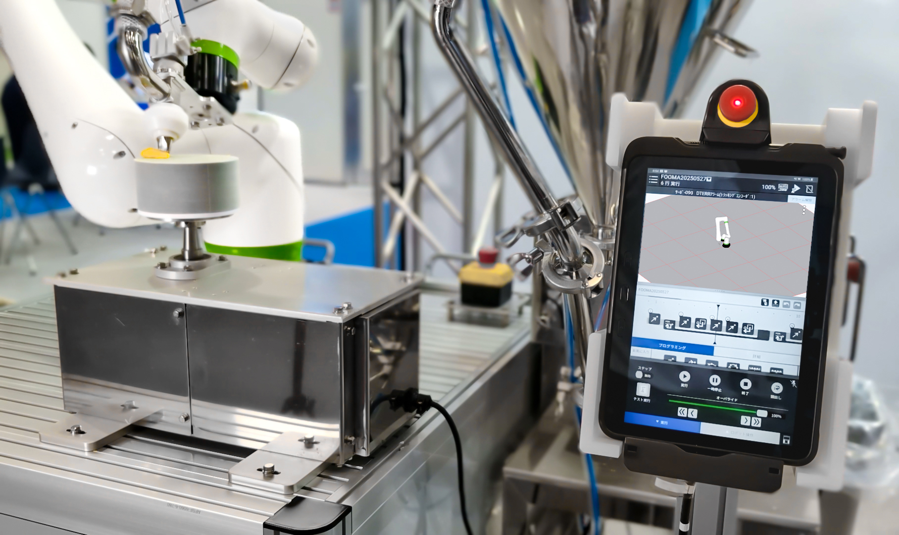 CRX 10i A Dispensing Icing on Cake with View of Tablet Teach Pendant