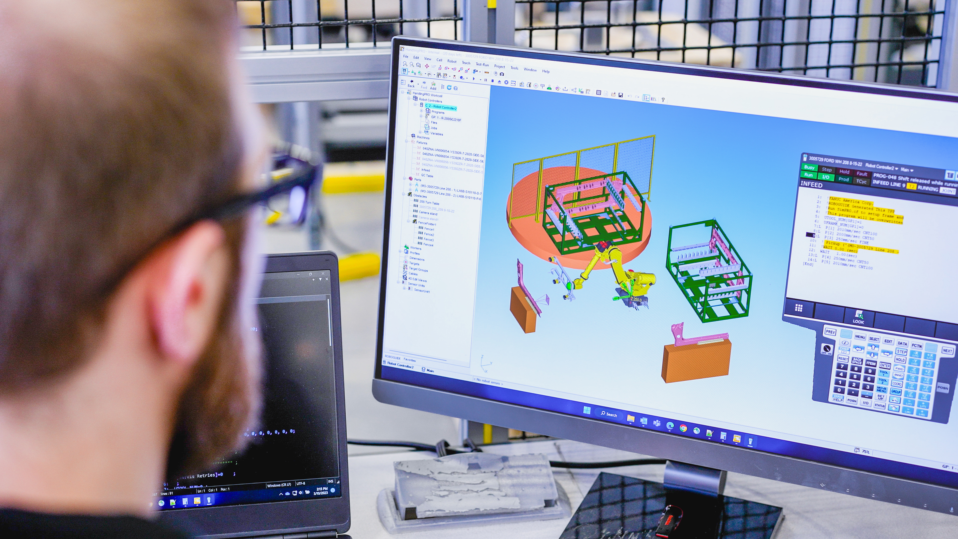 FANUC Engineer using ROBOGUIDE Close Up