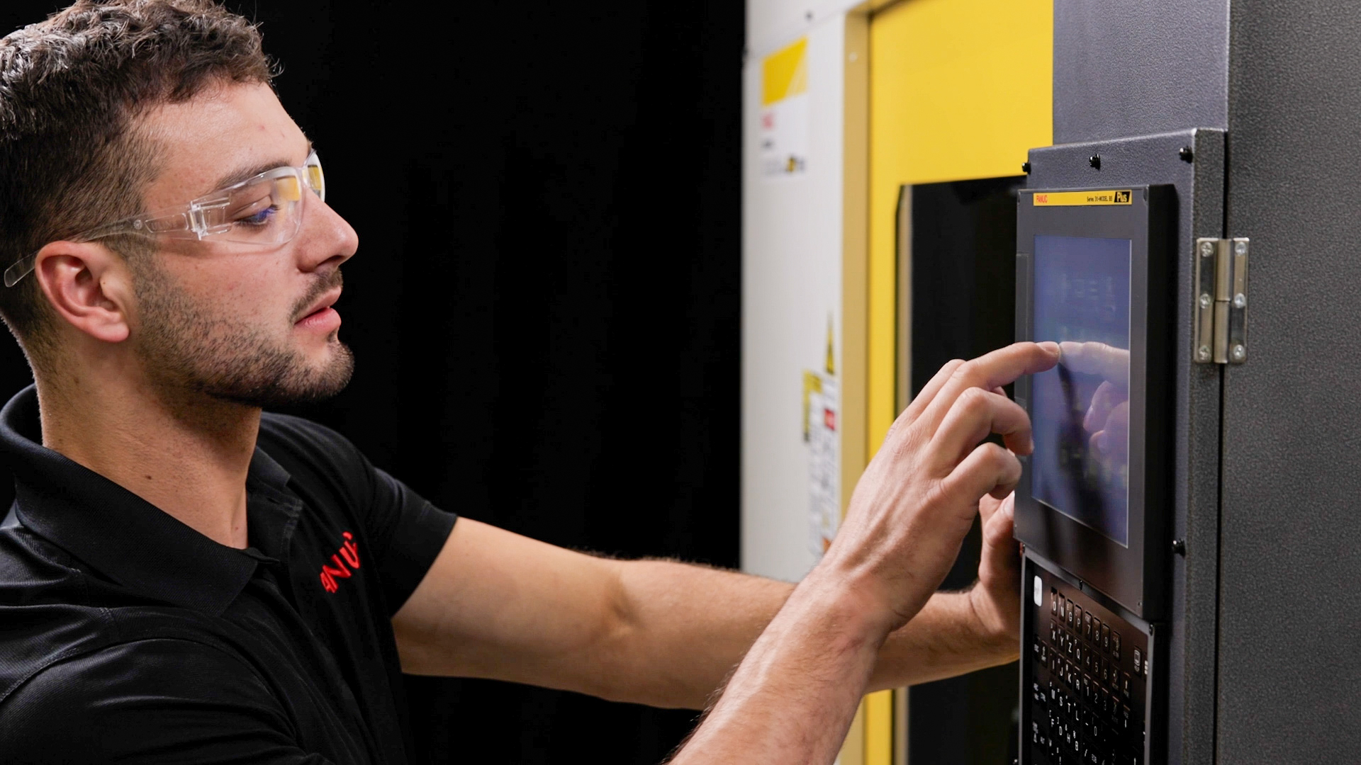 ROBODRILL Plus Technician Interacting With CNC Side View
