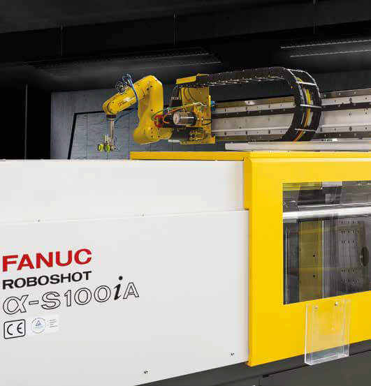 Robotic injection molding machine tending
