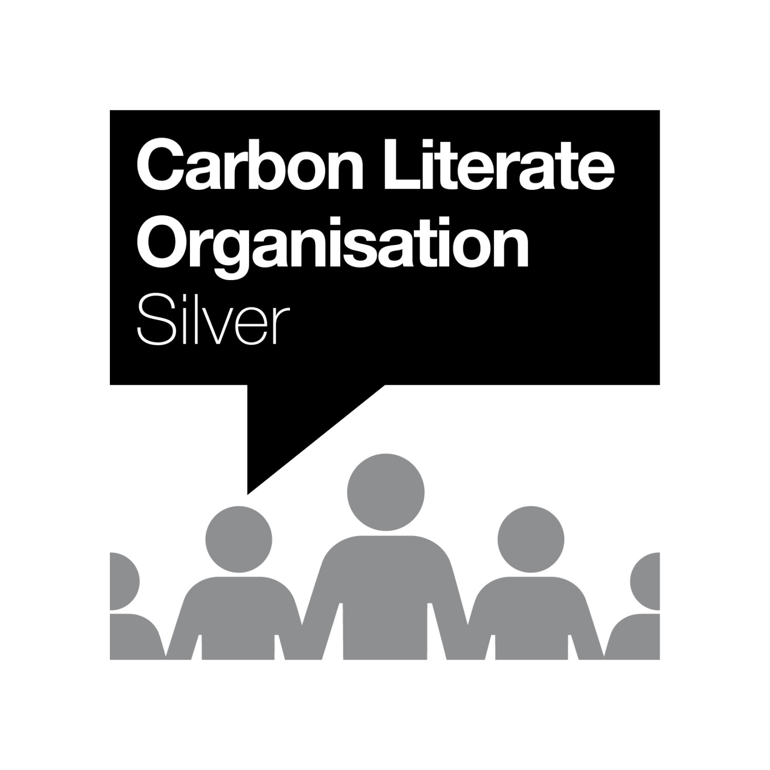Black speech bubble with white text reading "Carbon Literate Organisation Silver" above grey silhouettes of people on white background.