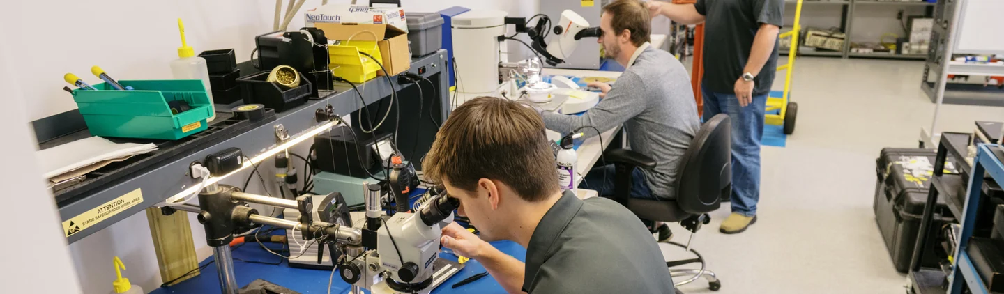 VPT employee's working in a lab