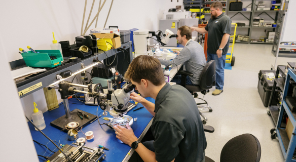 VPT employee's working in a lab