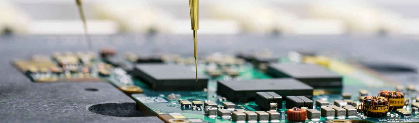 closeup of open DC-DC converter with needle installing parts