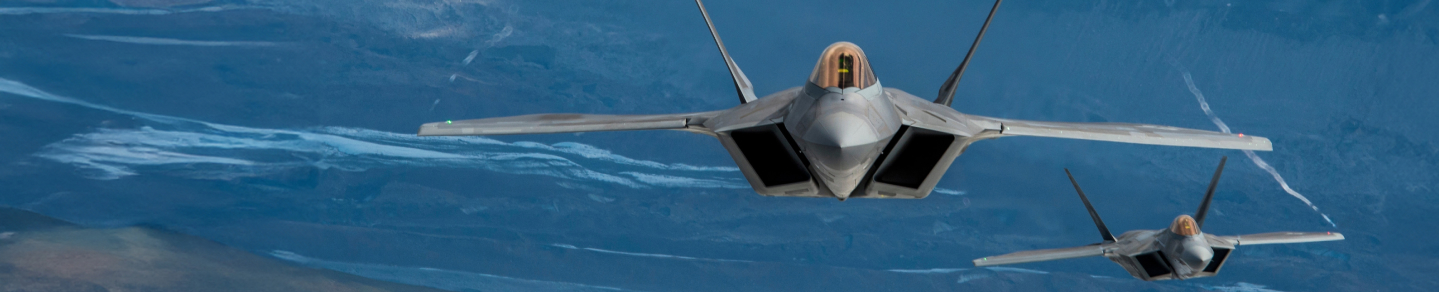 Fighter Jet flying in the sky with another jet to it's left