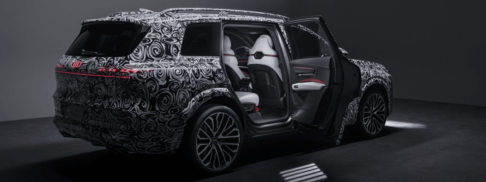 Audi Q9 header