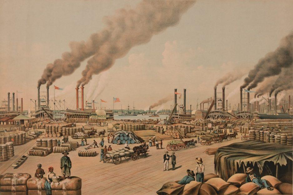 A bustling 19th-century port scene with numerous steamships docked along the river, emitting smoke. Workers load and unload goods from horse-drawn carts. Stacks of cargo and bales are arranged throughout the busy dock area.