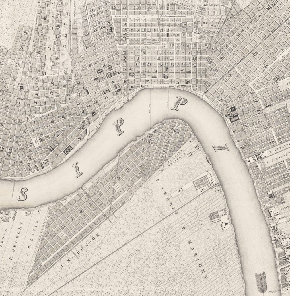 A vintage map showing a section of a city divided by a river labeled SIPP. The streets are densely packed with grid-like patterns on either side of the river, and various plots are marked throughout the map.