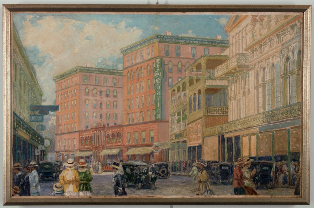 A vintage painting of a bustling city street with people in early 20th-century attire. Cars line the road, and tall buildings with detailed facades stretch into the distance. A prominent hotel sign is visible, and the sky is partly cloudy.