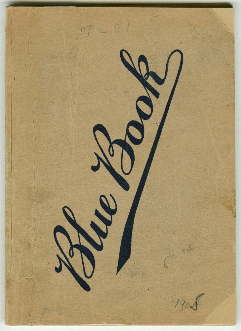 A vintage book with a brown cover, featuring the title Blue Book written in cursive. The cover has some handwritten notes, including 1903 at the bottom right.