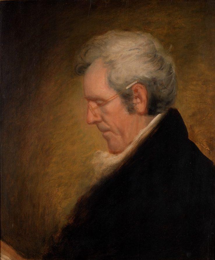 A painting of an older man with gray hair and glasses, dressed in dark clothing, is shown in profile against a warm, dark background.
