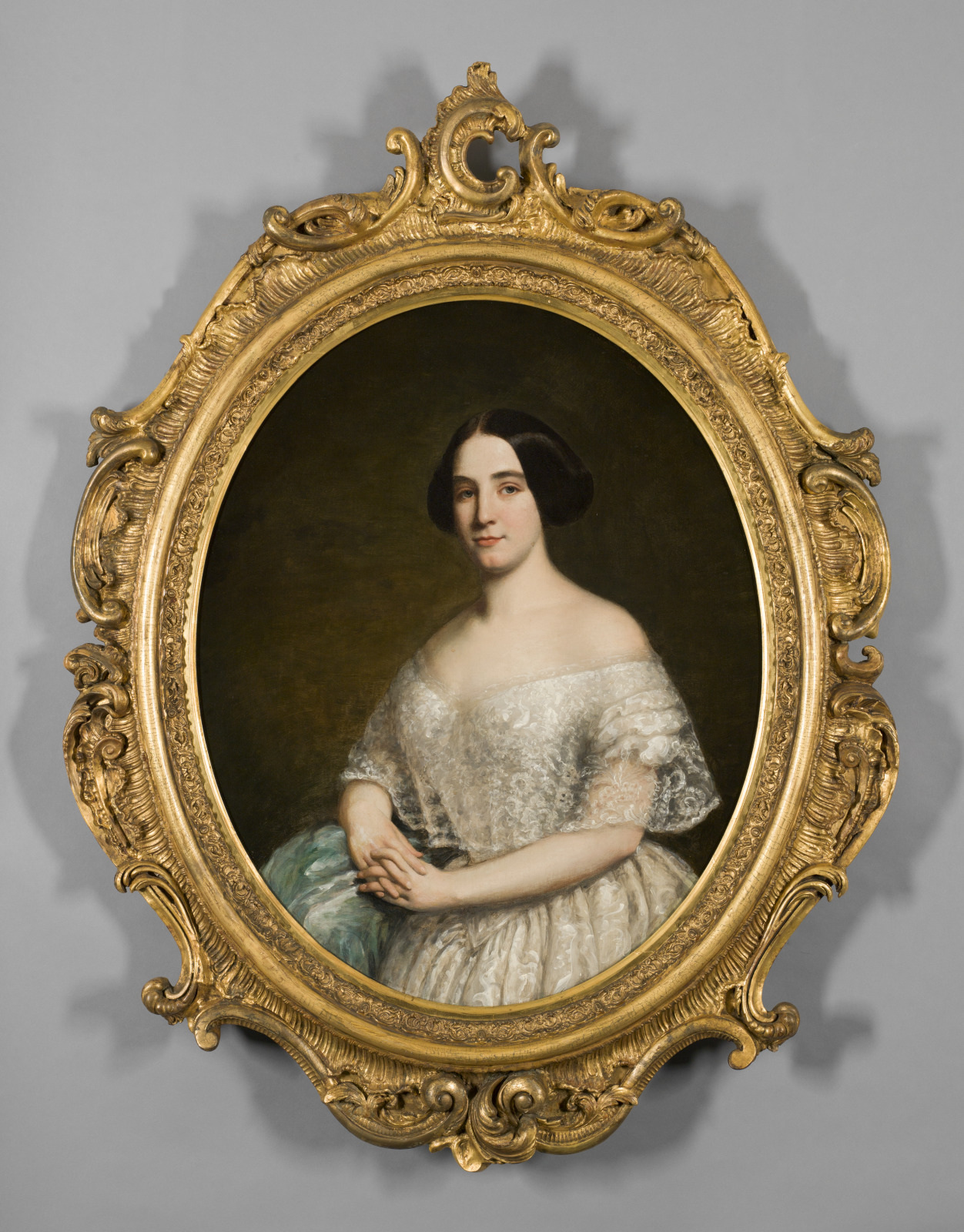Half-length portrait of Jenny Lind wearing an off the shoulder white lace dress.