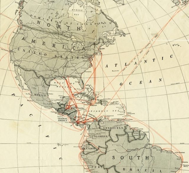 Vintage world map focusing on North and South America, with red lines indicating sea routes. The map features country labels like United States, Canada, Brazil, and others, with directional lines across the Atlantic and Pacific Oceans.