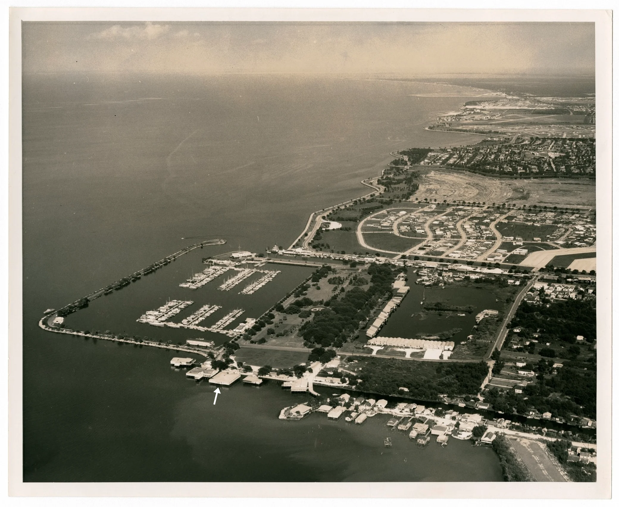 An overhead photo of West End Park at Lake Pontchartrain, with an arrow indicating My-O-My's location.