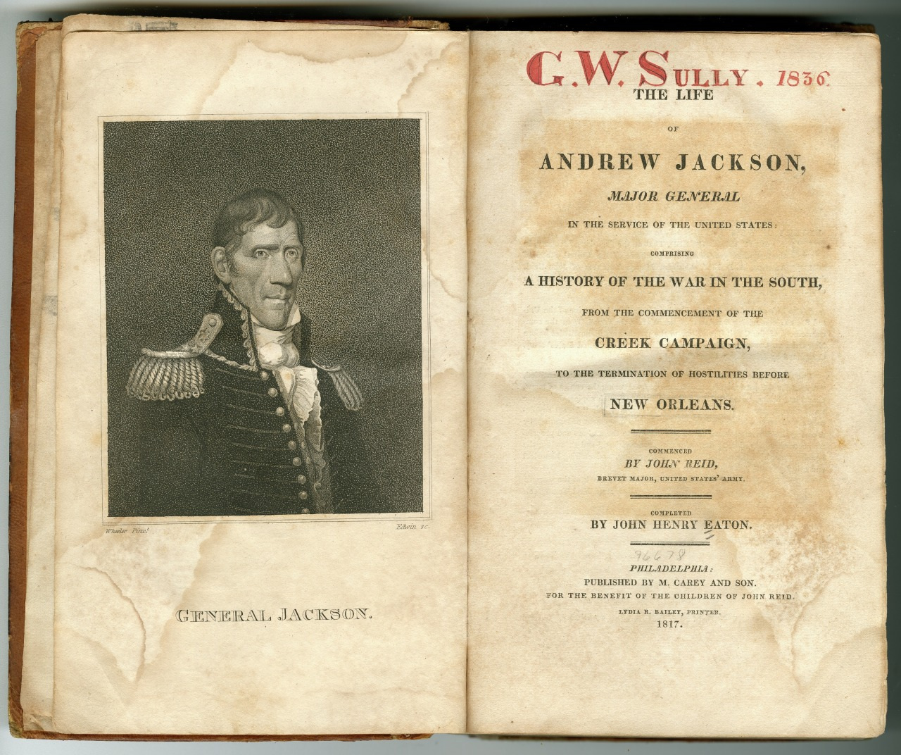 An old book titled The Life of Andrew Jackson by John Reid and John Henry Eaton, published in 1817. The left page features an illustration of Andrew Jackson in military attire, labeled General Jackson. The right page displays the books title details.