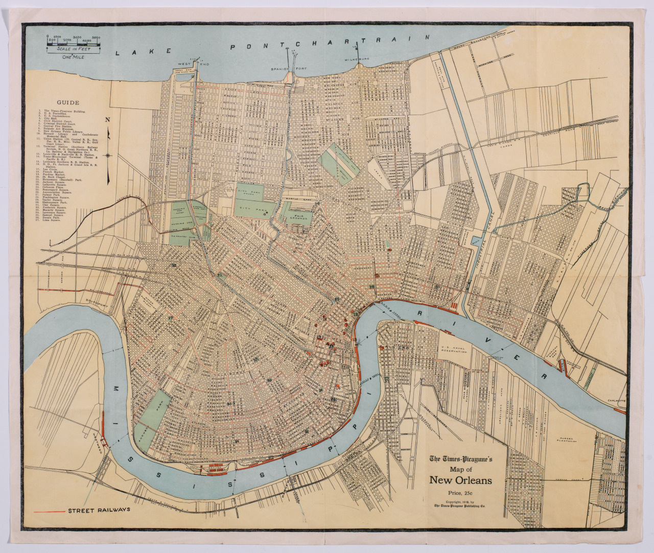 A vintage map of New Orleans from the Times-Picayune, featuring detailed streets and railways. The map displays the city bordered by the Mississippi River and Lake Pontchartrain, with a guide list on the left-hand side.