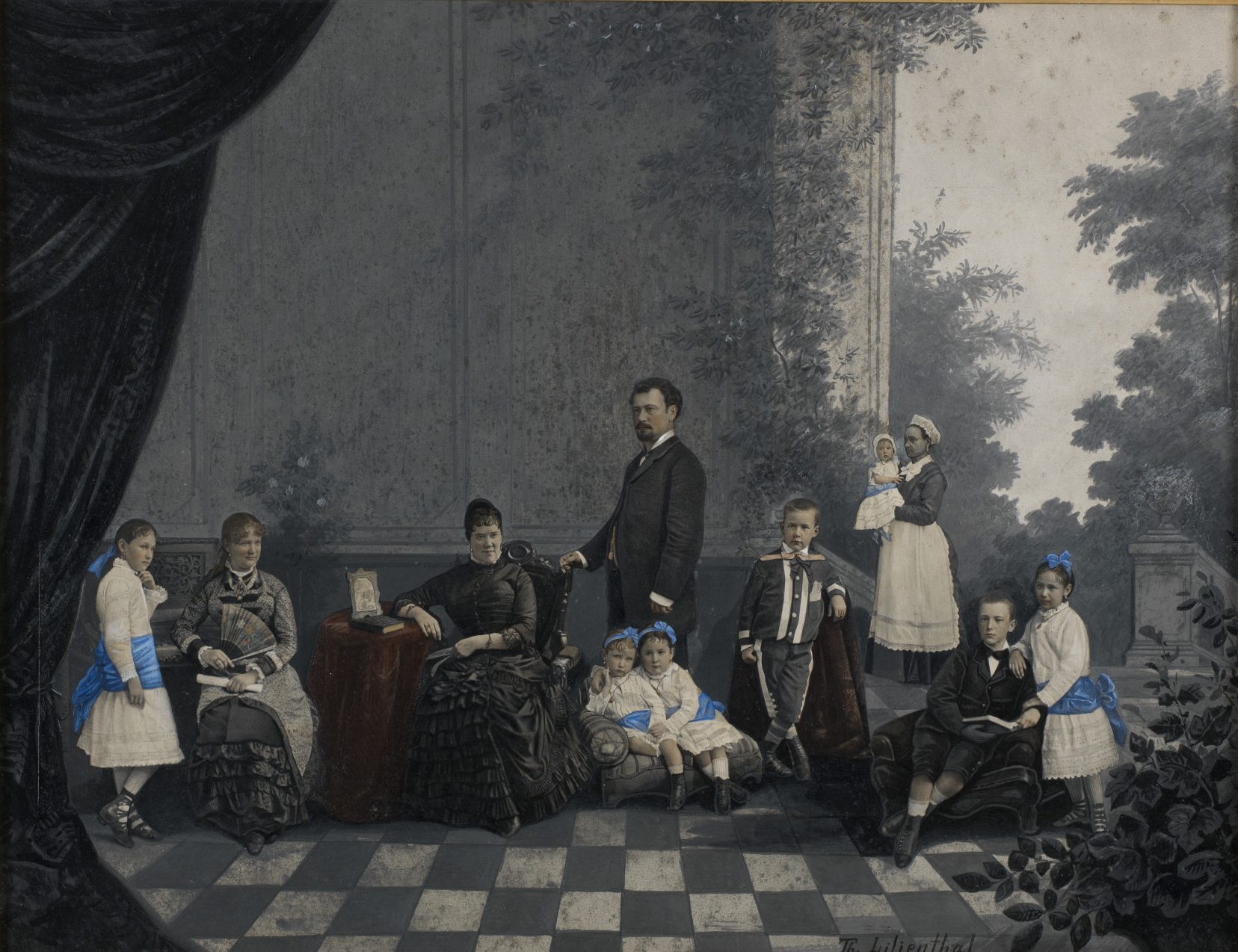 A cropped view of a photo montage of the Braughn family in New Orleans. Individual photos of family posed in various positions are arranged in a way that makes it appear they're in the same photograph.