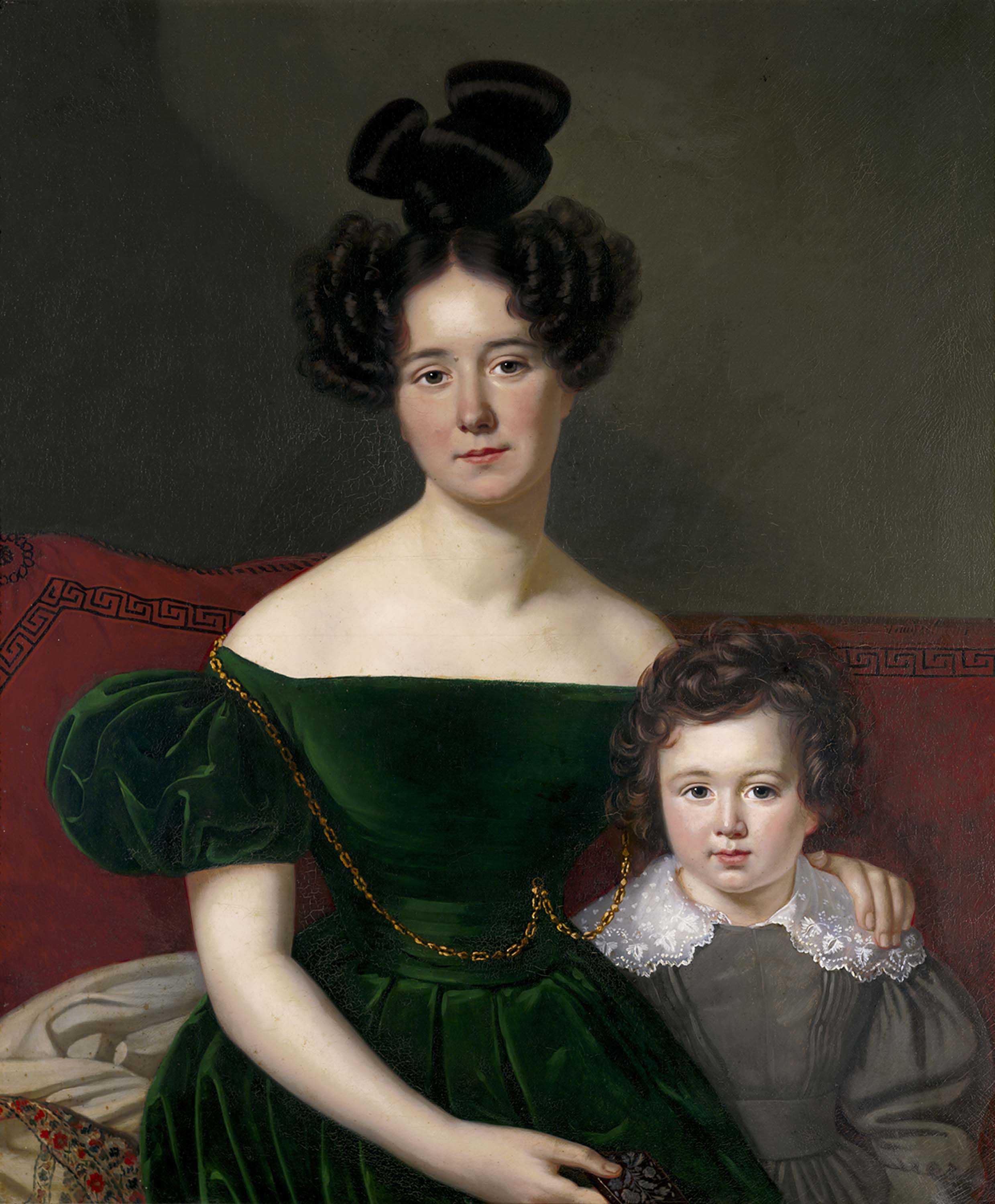 A historical painting of a woman in a green dress with puffed sleeves and elaborate hairstyle. She sits on a patterned red sofa, holding a young child with curly hair, dressed in a white-collared outfit. Both have calm expressions.