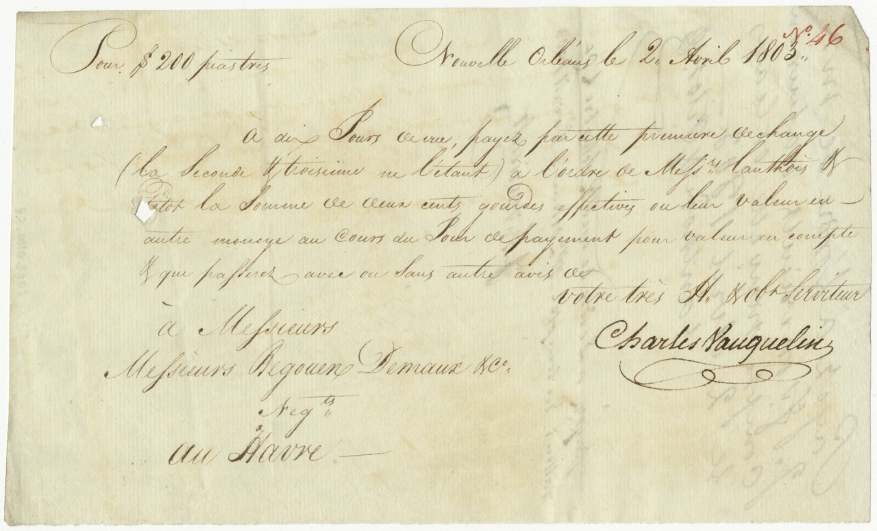 An aged document with handwritten French text, dated 2 April 1803. The script includes financial terms such as payment, and is signed by Charles Vauquelin. The paper shows signs of wear, and there is a faint red marking in one corner.