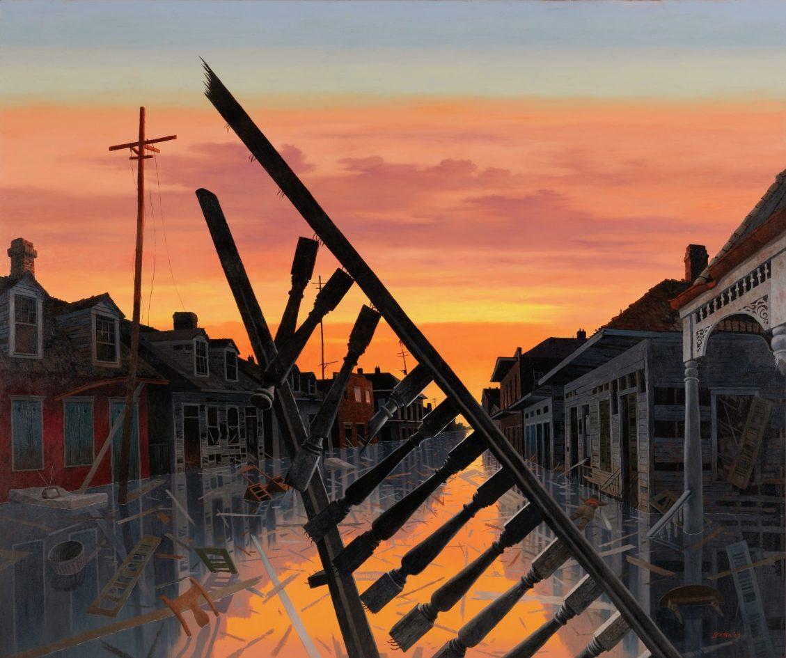 A street flooded with reflective water at sunset. Damaged wooden poles and debris are scattered, with rows of darkened houses on both sides. The sky is orange, with hues of pink and purple, creating a dramatic contrast with the somber scene.