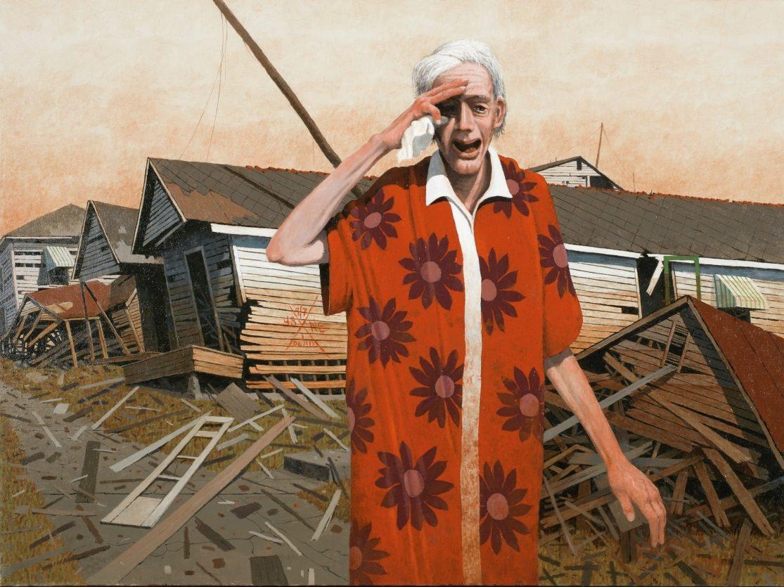 An elderly person with white hair, wearing a red dress with large flower patterns, stands amidst the debris of damaged houses. The sky is overcast, and the scene conveys a sense of distress and devastation.