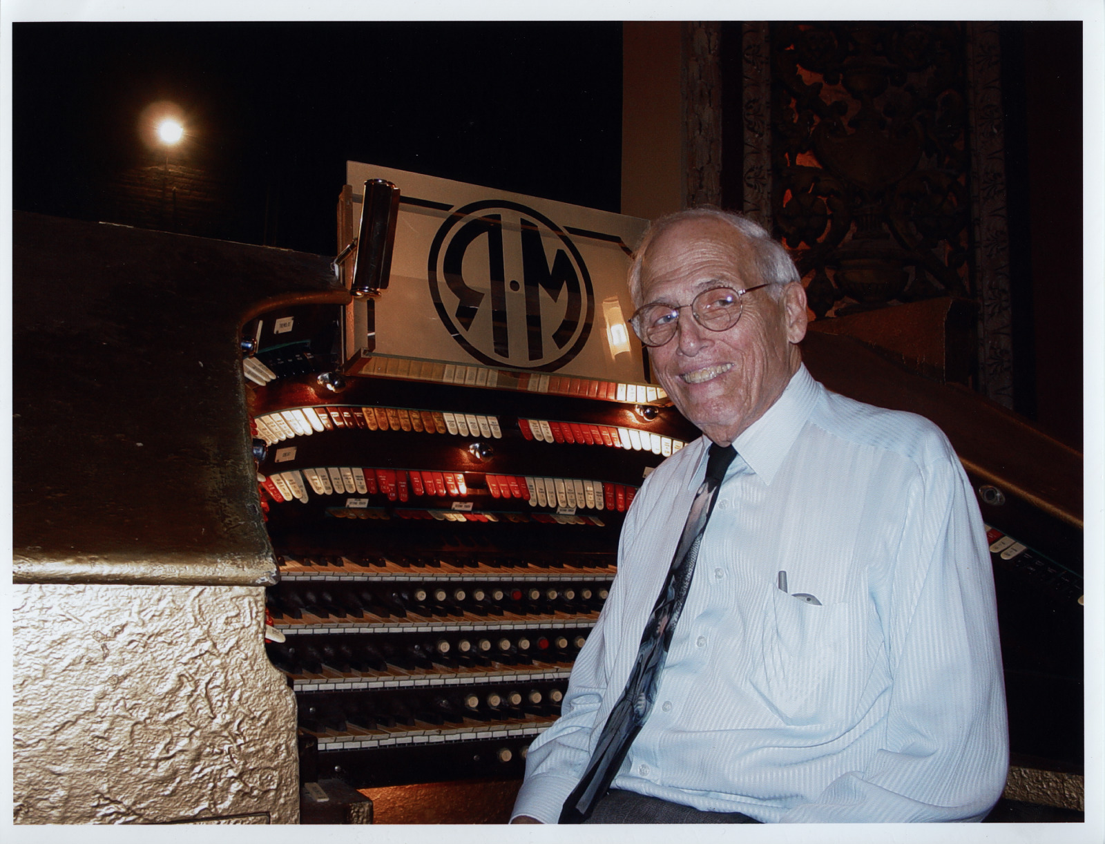 Rene Brunet Jr. at the Saenger Theatre in 2003. The theater's organ can be seen behind him.