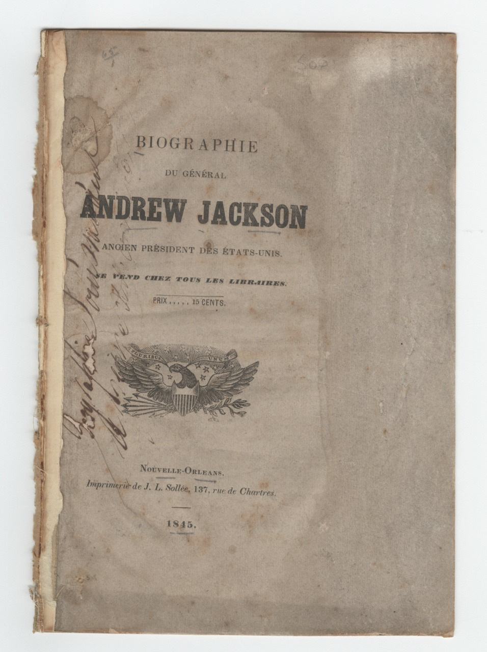 Cover of an old French book titled Biographie du Général Andrew Jackson. The text includes pricing information and publication details, printed by J.L. Sollée in New Orleans, 1843. The cover is worn with handwritten notes on the side.