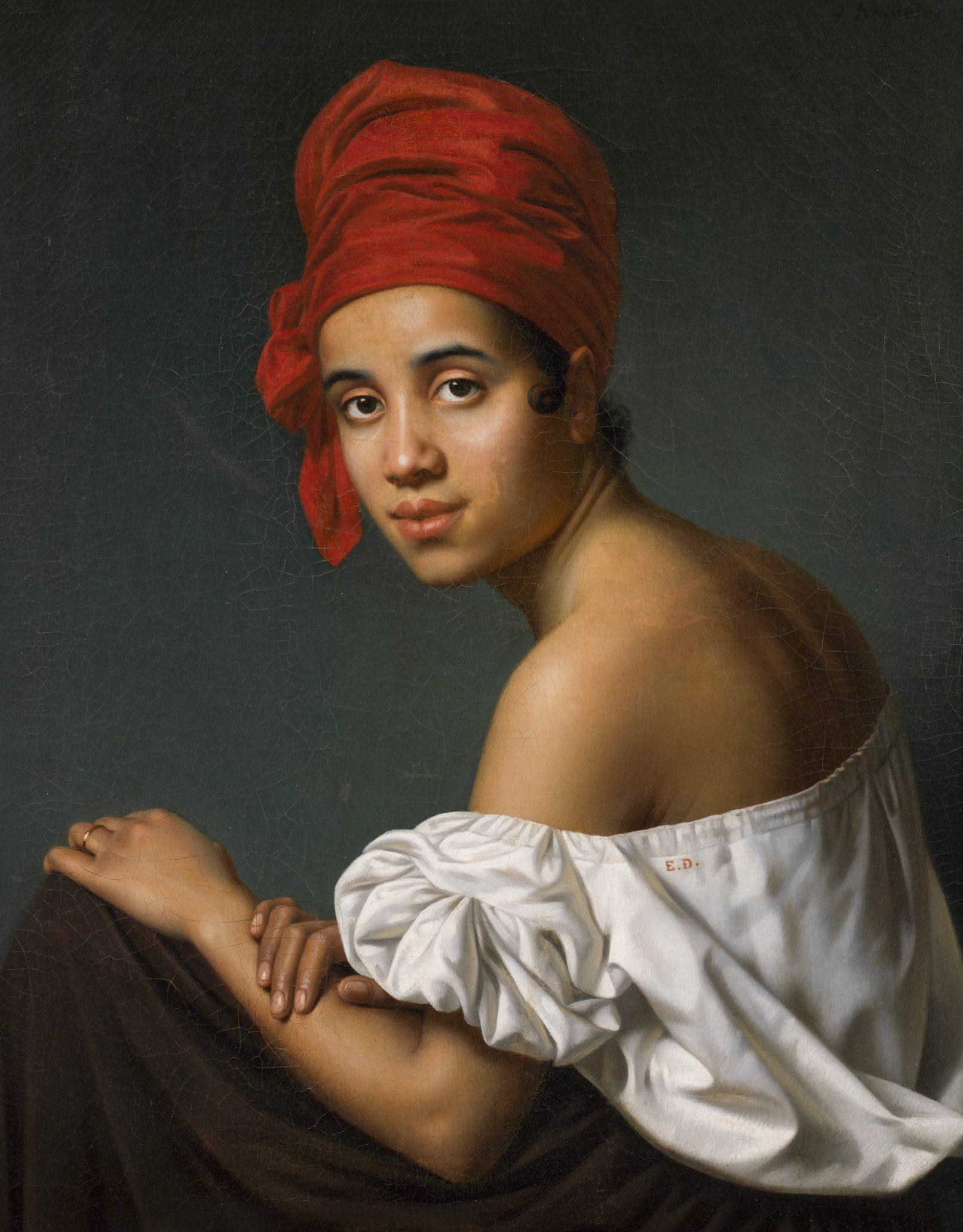 Portrait of a woman wearing a red headscarf and a white off-the-shoulder blouse. She gazes toward the viewer, seated against a dark green background, with her hands gently resting on her lap.